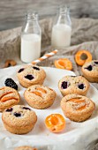 Financier cakes with apricots and blackberries