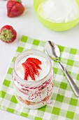 Strawberry and cream cheese dessert in a glass jar