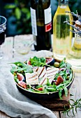 Rocket salad with grilled goats' cheese, figs and olives