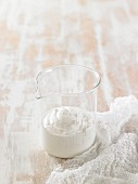 How to prepare vegan macadamia nut cheese: finely puréed nut mixture in a measuring jug