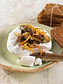 Vegan macadamia nut cheese with chanterelle mushrooms and wholemeal bread