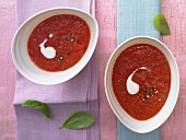 Chilled melon and tomato soup with yoghurt and basil