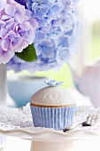 Afternoon tea served with a gourmet cupcake