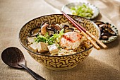 Japanese mapo tofu ramen soup with mushrooms and poached egg