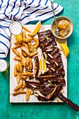 Spicy spare ribs with honey and potato wedges