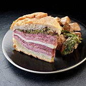 A muffuletta sandwich with olive tapenade