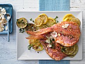 How to prepare pan-fried red mullet on a bed of caramelised citrus fruit slices