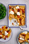 One-pot nachos with chicken, chorizo, jalapenos and cherry tomatoes