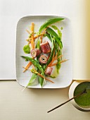 Tofu and Prosciutto rolls on a bed of salad