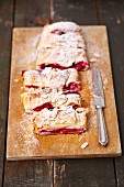 Puff pastry strudel with cherries and föaked almonds