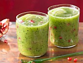 Kiwi and lime cocktail with pomegranate seeds