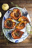 Roasted pumpkin with thyme on a plate