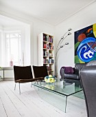 Lounge area in renovated, retro period apartment with bay window