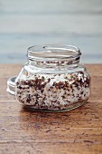 Pepper and apricot salt in a screw-top glass jar