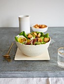 Caesar salad with anchovies, egg and croutons