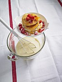 Buttermilk and raspberry pancakes with maple syrup
