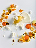 Vanilla cream with passionfruit sorbet, meringue and carrot foam