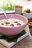 White gazpacho with coconut, grapes and almonds