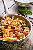 Penne with cheese, aubergine and tomatoes