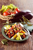 Spanish-style vegetable salad with aubergine and egg