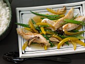 Asian-style chicken fillet with shiitake mushrooms, green beans and yellow pepper