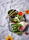 Rice paper rolls with tuna, avocado, apple and herbs