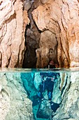 Scuba diver in Chandelier Cave,Palau