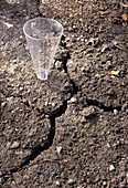 Dry Soil and Rain Gauge