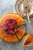 A sliced cake with blood oranges
