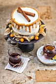 A carrot layer cake with mascarpone icing and chai caramel