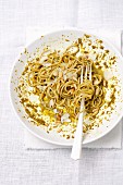 Spaghetti with pesto and pine nuts