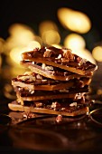 A stack of toffee with nuts