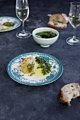 Italian salsa verde served with bread and white wine