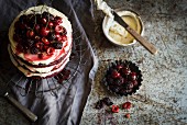 Red velvet cake with berries and cherries