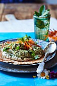 Green falafel with baba ganoush and carrot goji berry salad