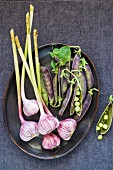 Fresh garlic and purple peas