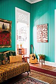 Old-fashioned living room with turquoise wall covering