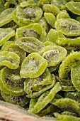 Candied kiwi slices at a market stall