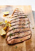Grilled salmon on a chopping board