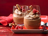 Mousse au chocolat with pine nut brittle and raspberries