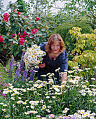 Woman picking flowers