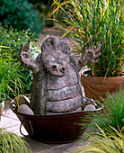 Ceramic alligator in tin bowl