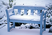 Garden bench with snow