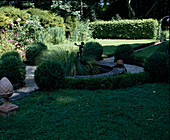 Round border with Buxus (box) hedge and balls