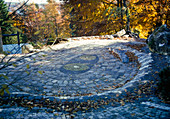 Oval square with surrounding pavement