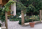 Garden entrance with sandstone columns