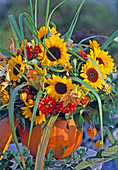 Autumn bouquet in pumpkin as a vase