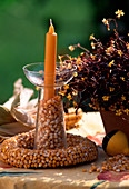 Wreath of corn kernels, glass with corn kernels