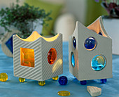 Lanterns made of clay and coloured glass