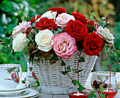 White basket with various rose flowers, hydrangea (hydrangea)